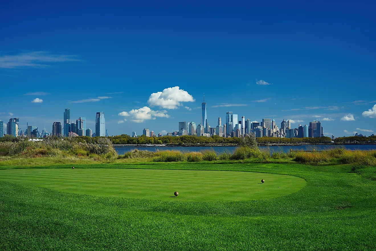 Golfer hit sweeping driver after hitting golf ball down the fairway. Editorial credit: Photoongraphy via Shutterstock.com.