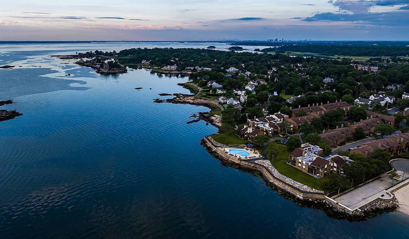 A high angle, aerial view over the calm waters of the Long Island Sound by Rye Beach, New York.