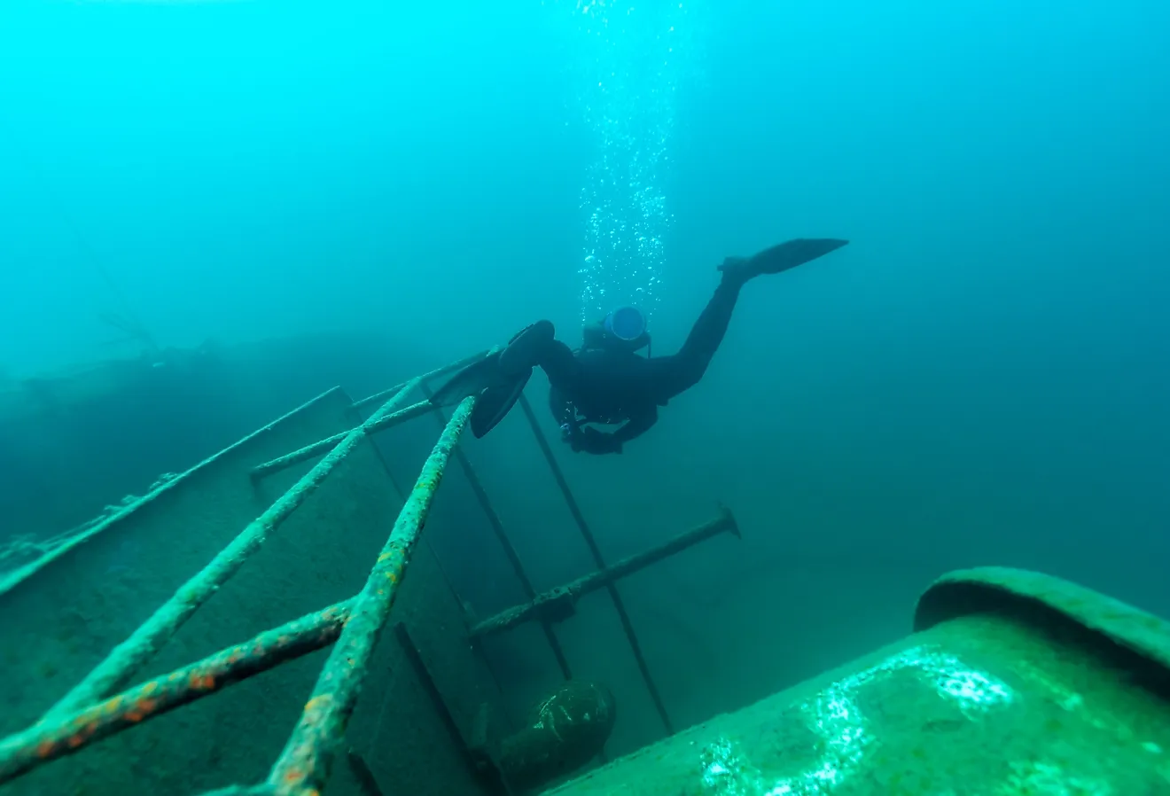 Diver exploring a Great Lakes shipwreck found in Lake Superior.
