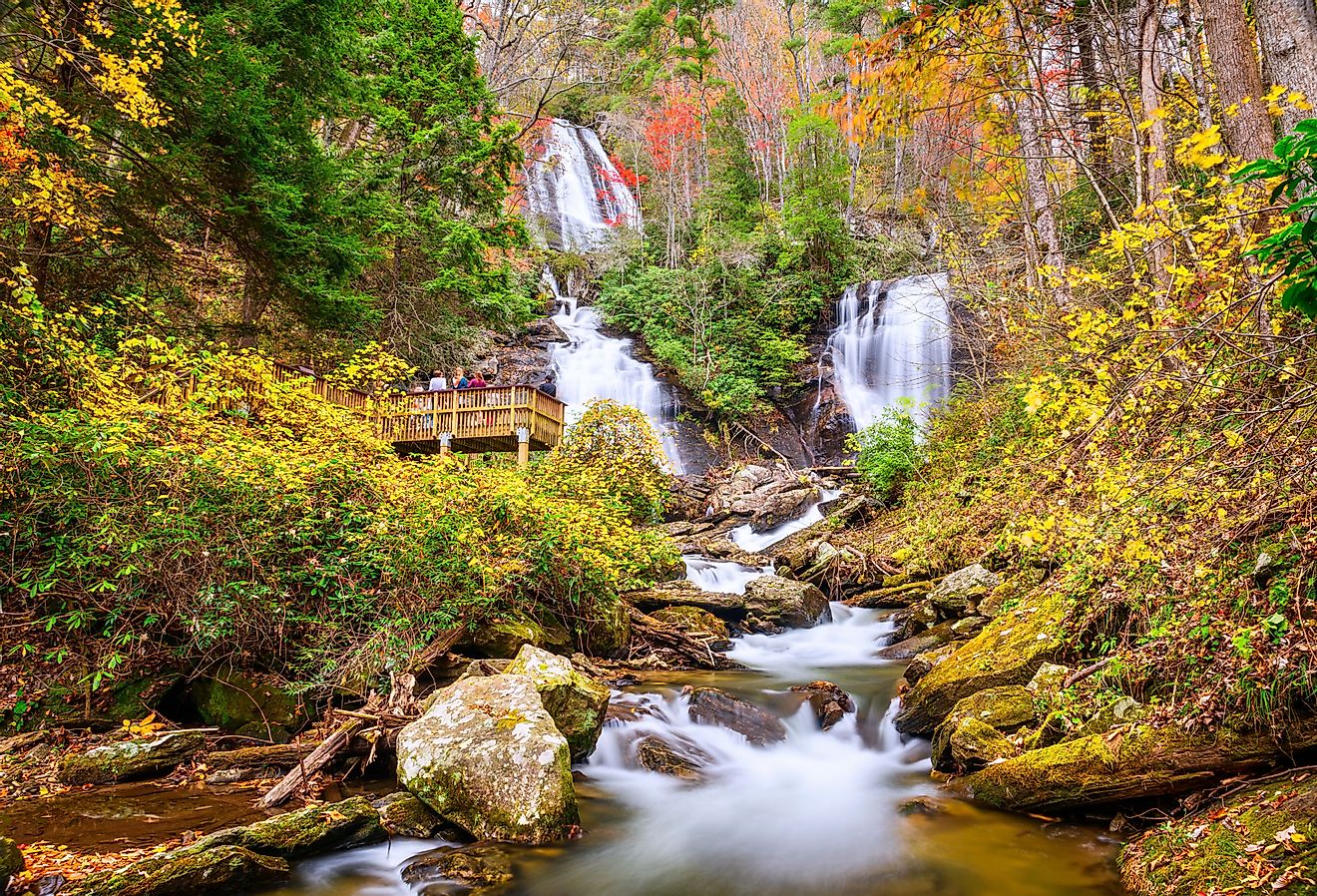 Anna Ruby Falls, Georgia, with tourists in autumn.