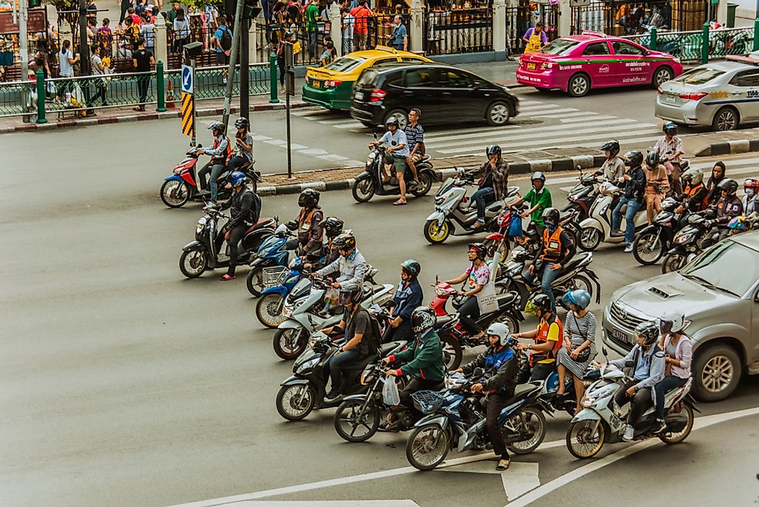 Motorbike riders in Bangkok, Thailand. Editorial credit: Nathan Bai / Shutterstock.com.
