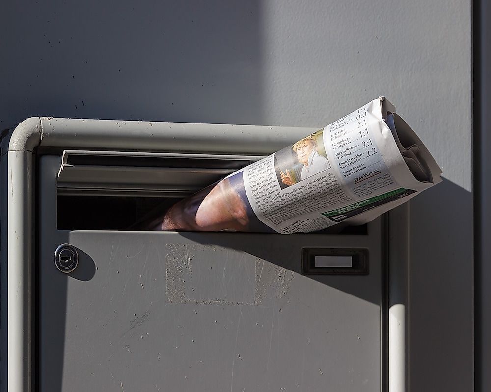 Newspapers bring the news of the world to the breakfast table of a home.