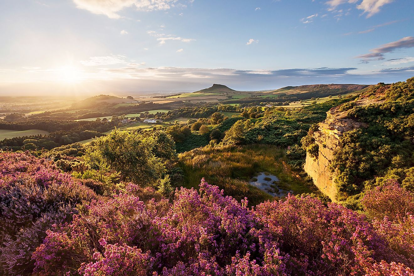 Sunset behind Roseberry Topping, taken from Cockshaw Hill in the North York Moors National Park. Image credit: matrobinsonphoto/Shutterstock.com