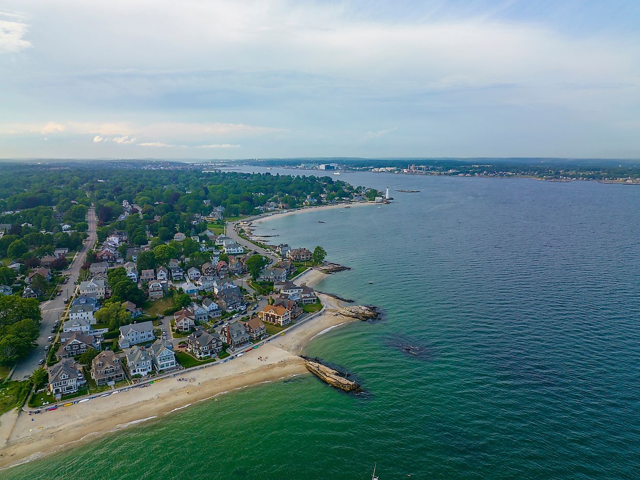Pequot Point Beach and New London Harbor Lighthouse at the mouth of Thames River in city of New London, Connecticut.