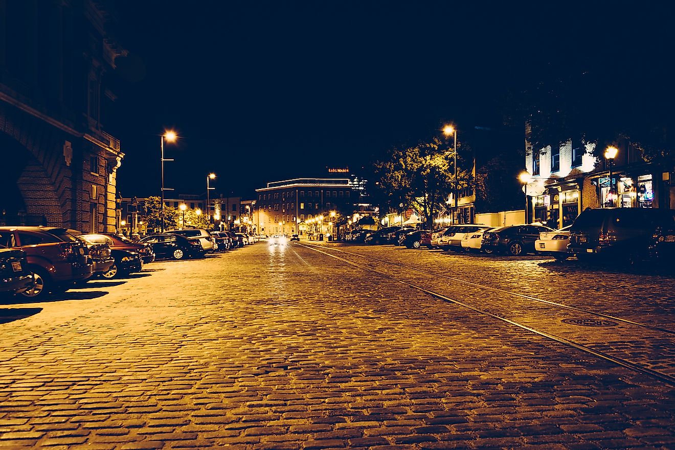 Cobblestone street in Fells Point at night, Baltimore, Maryland. Image credit: ESB Professional/Shutterstock.com