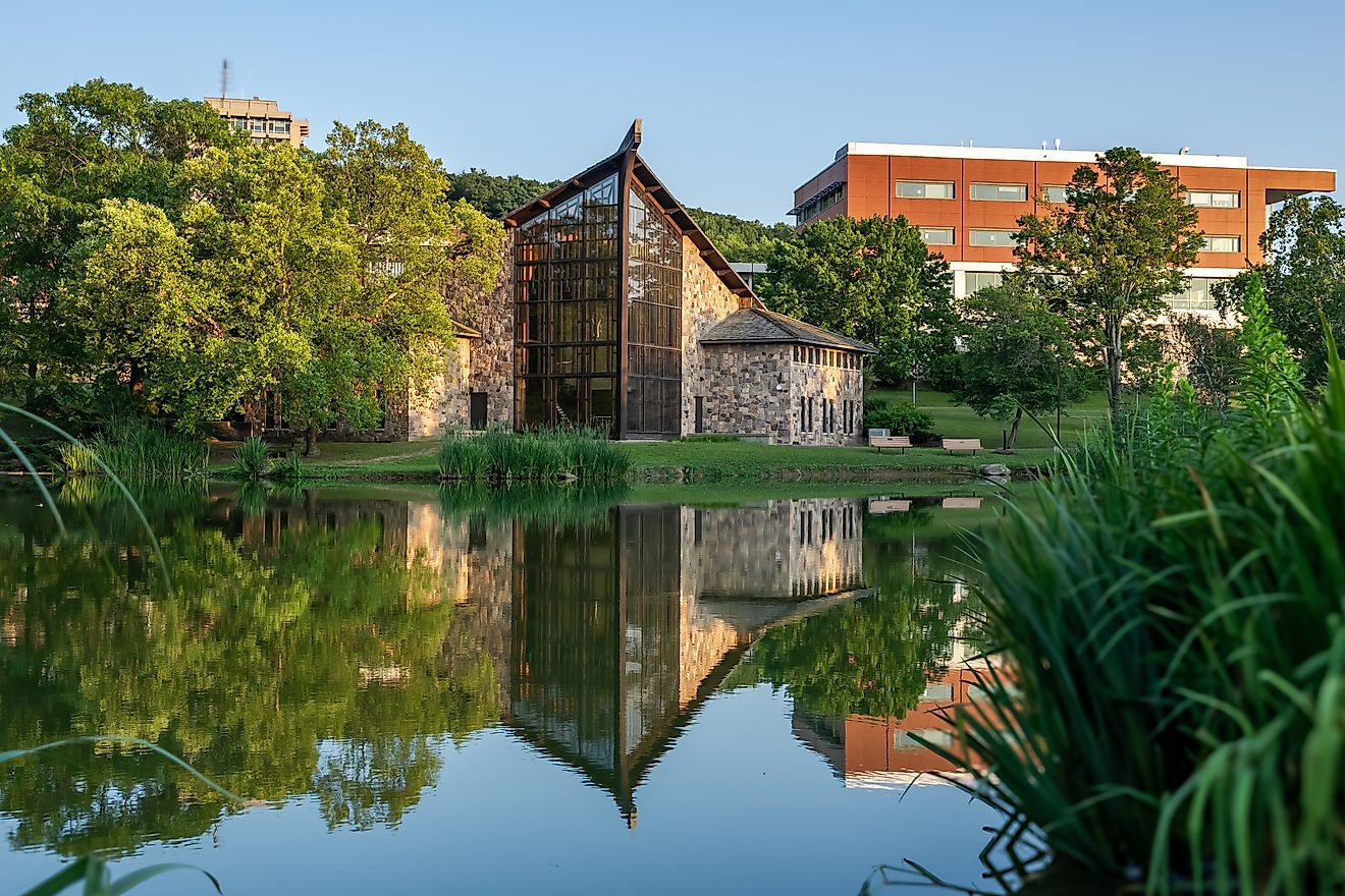 Ithaca College Muller Chapel and Chapel Pond, Ithaca, New York. By SEALANDSKYPHOTO / Shutterstock.com