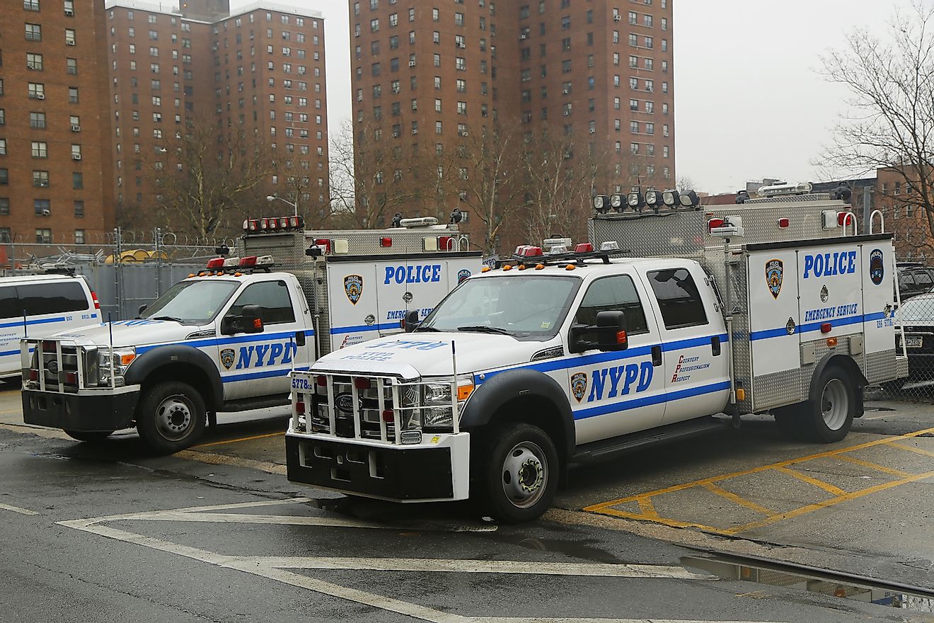  Police cars in East Harlem, Upper Manhattan. The New York Police Department, established in 1845, is the largest police force in USA. Image credit: Leonard Zhukovsky/Shutterstock.com