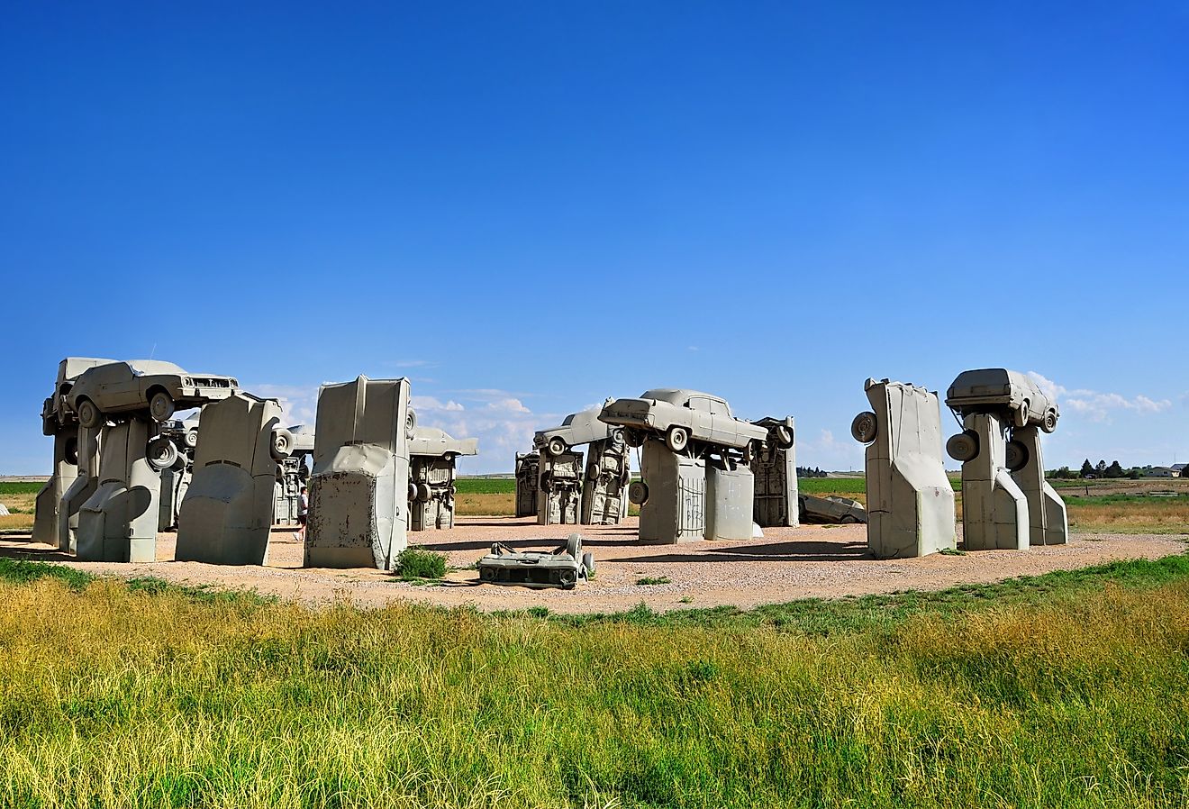 Carhenge, famous car sculpture recreating the Stonehenge in England created and installed by Jim Reinders dedicated to his father in Alliance, Nebraska. Image credit Edwin Verin via Shutterstock.