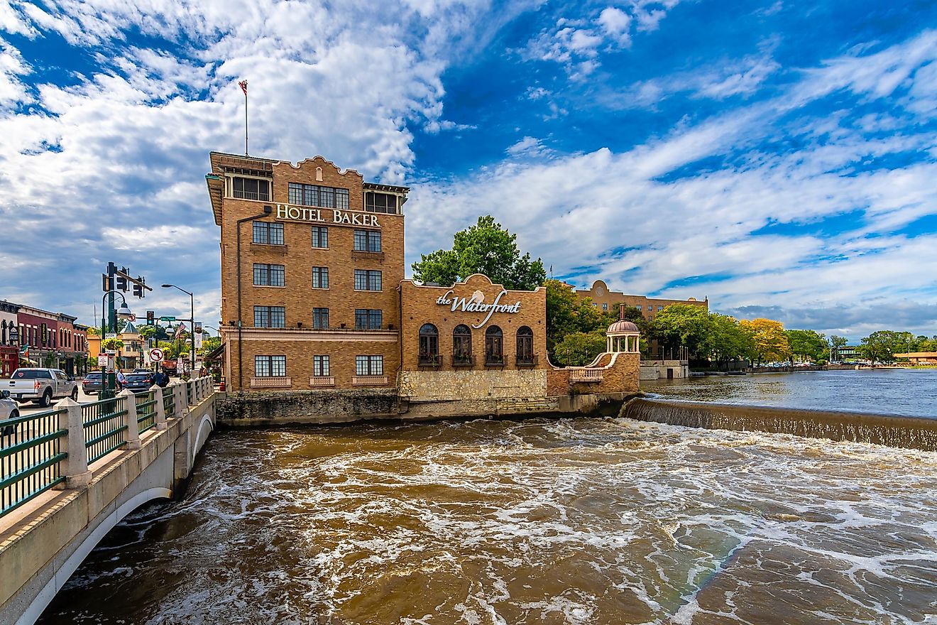 The brown-brick, historic Hotel Baker stands beside Main Street and the Fox River. Photo: Nejdet Duzen