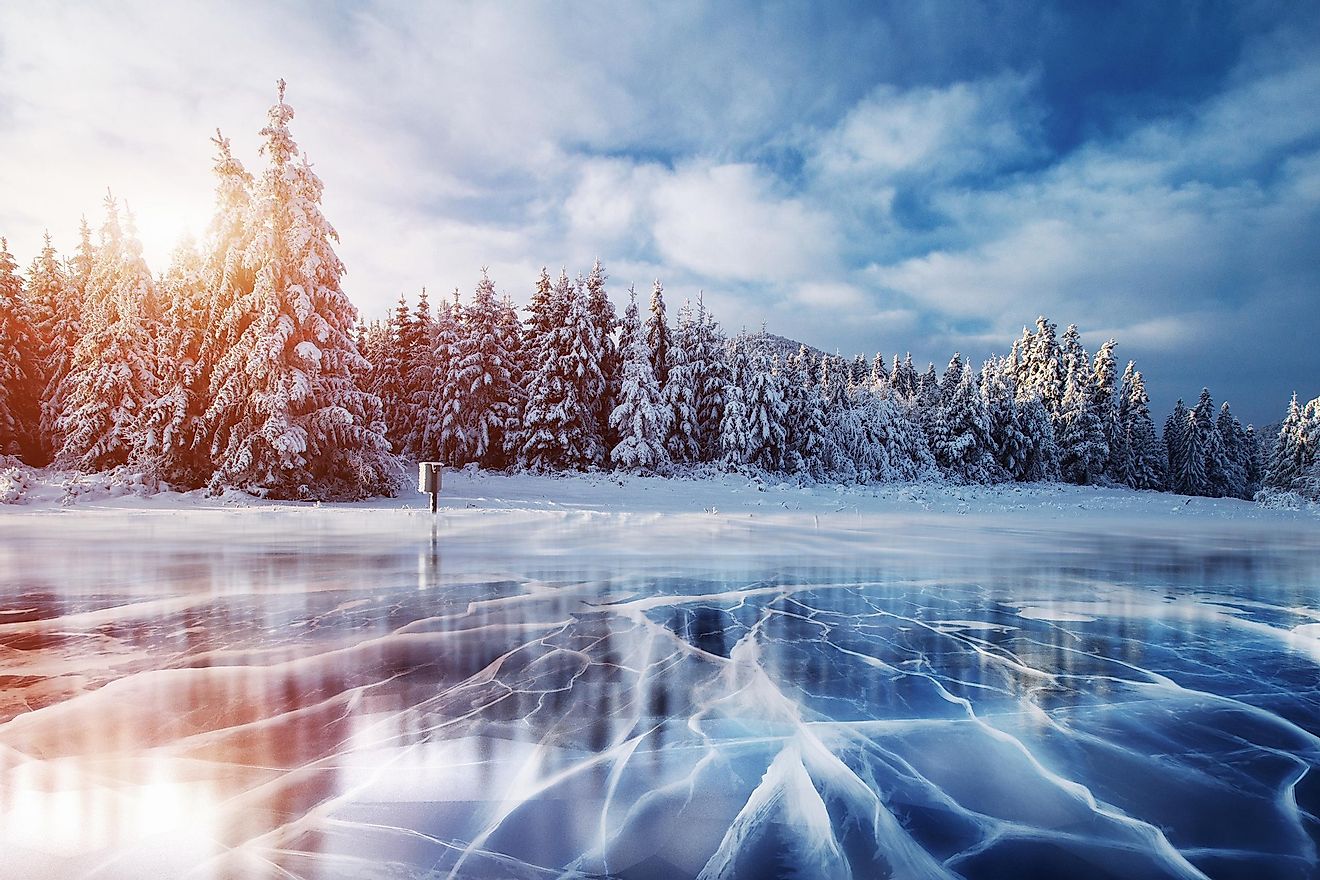 A Frozen Lake with a Layer of Ice Floating on Top, The Hills of Ice, Carpathian Ukraine