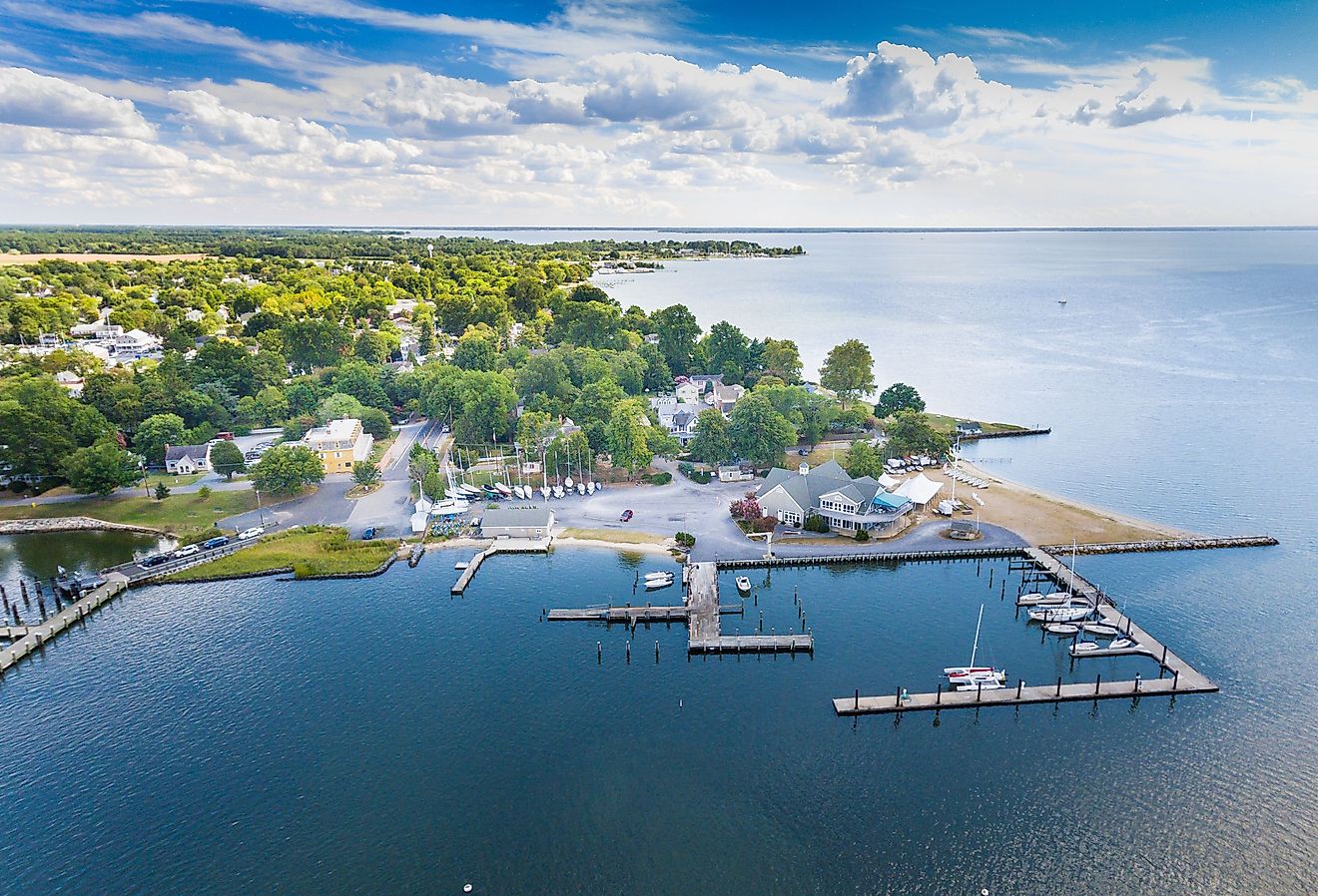 Aerial view of Oxford, Maryland on the Chesapeake Bay with clouds, water and shoreline.