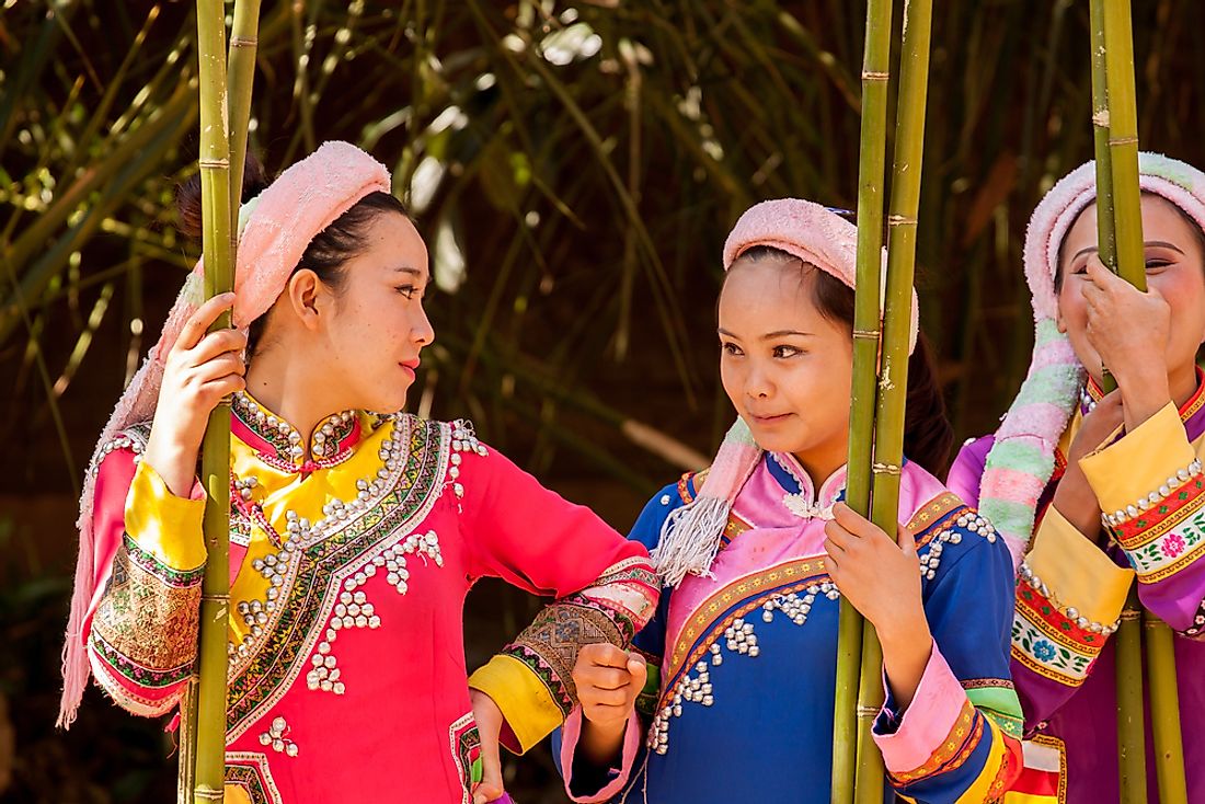 Lahu women after performing a traditional dance in Kunming, China. Editorial credit: Kasia Soszka / Shutterstock.com.