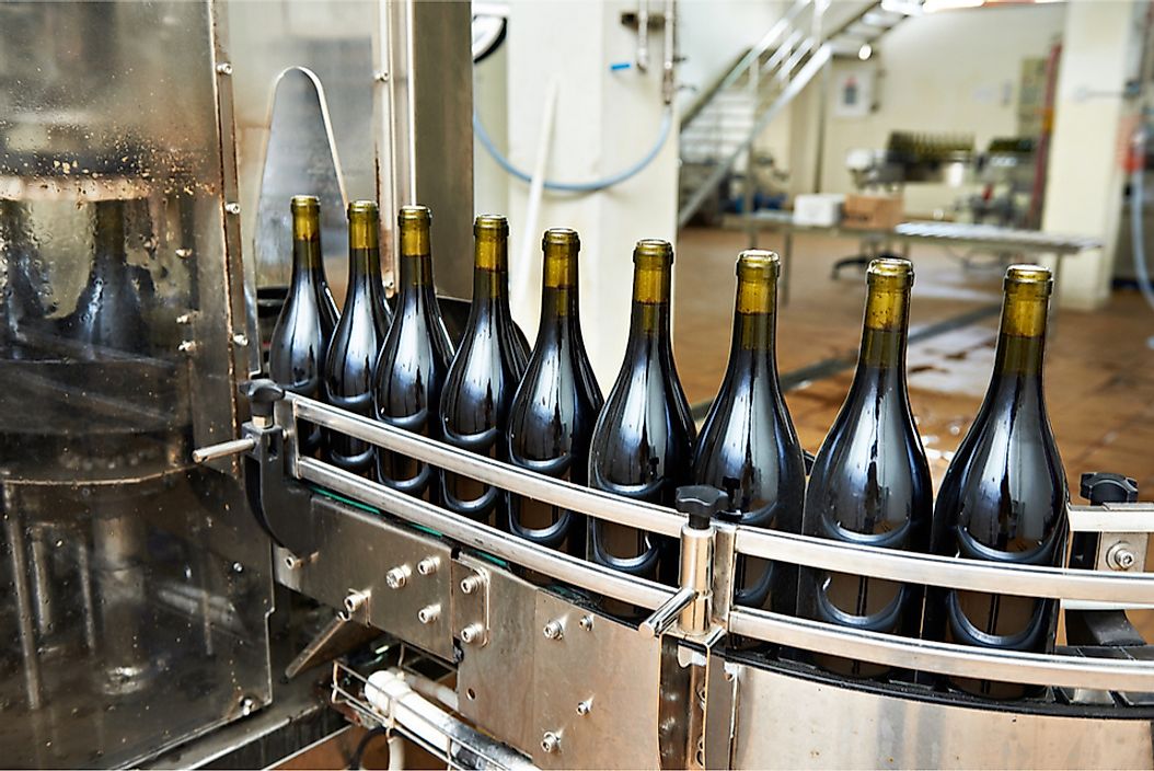 The bottling and sealing process at a winery.
