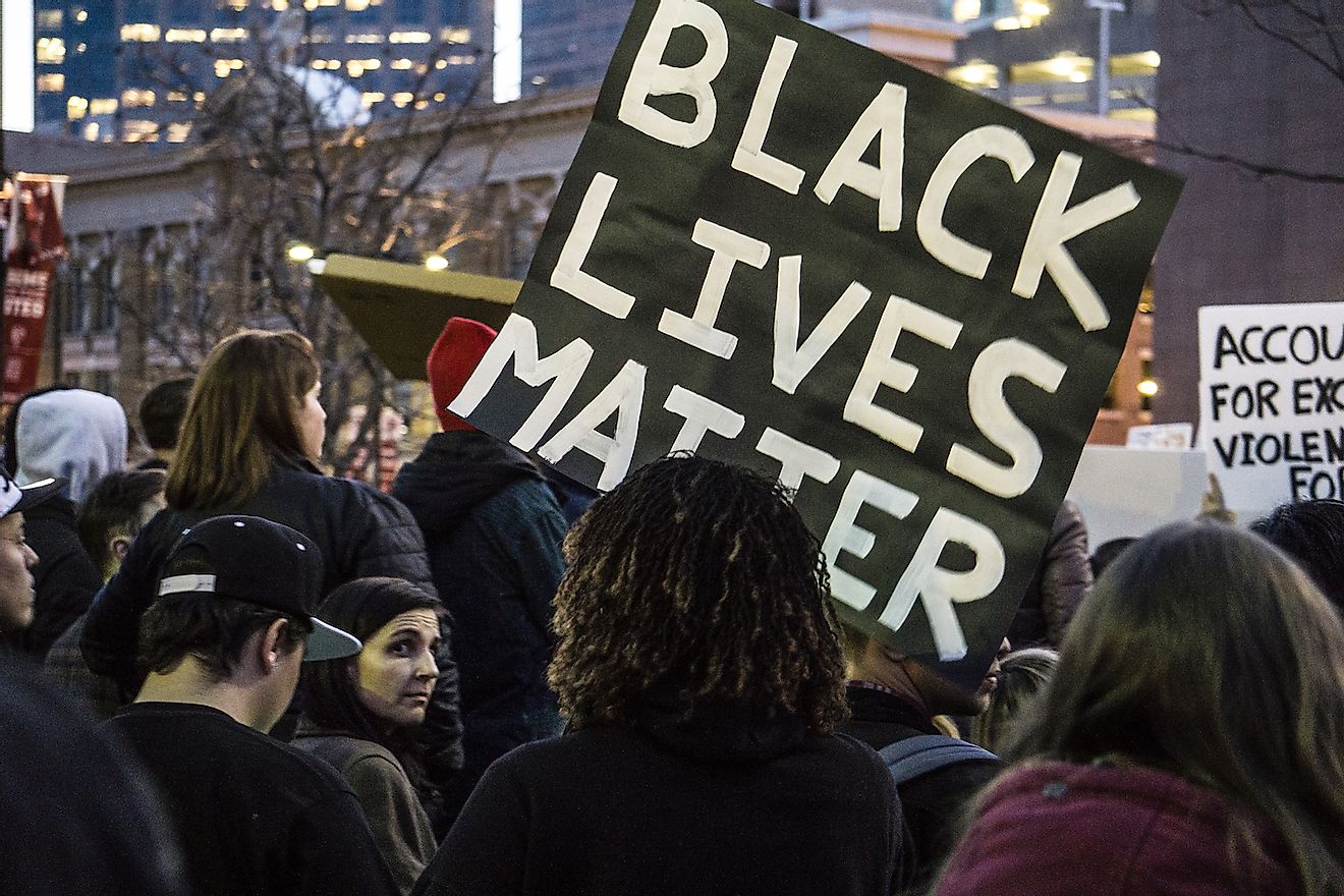 People rally against police brutality in Salt Lake City after Abdi Mohamed was shot by a police officer on January 27th, 2015. Image credit: Brent Olson/Shutterstock.com
