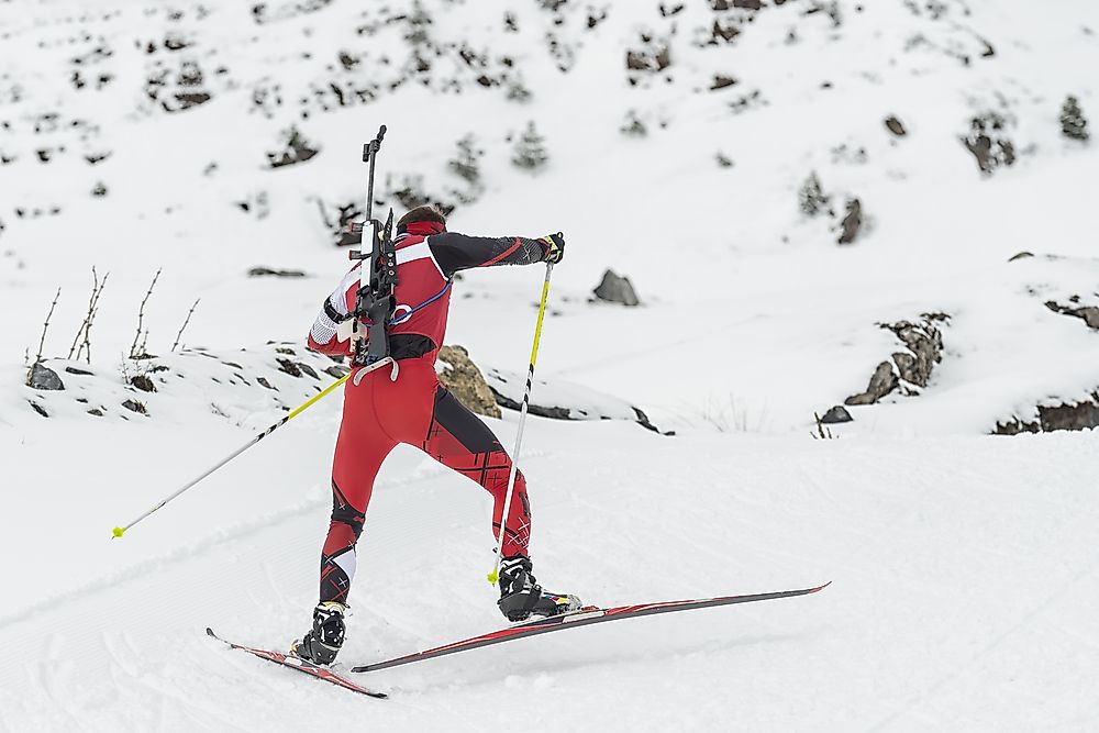 An athlete participating in a Biathlon event. 