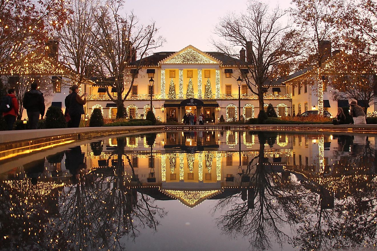 Williamsburg, Virginia: Holiday decorations at the Williamsburg Inn reflected in an outdoor fountain. Editorial credit: Christopher W Becke / Shutterstock.com