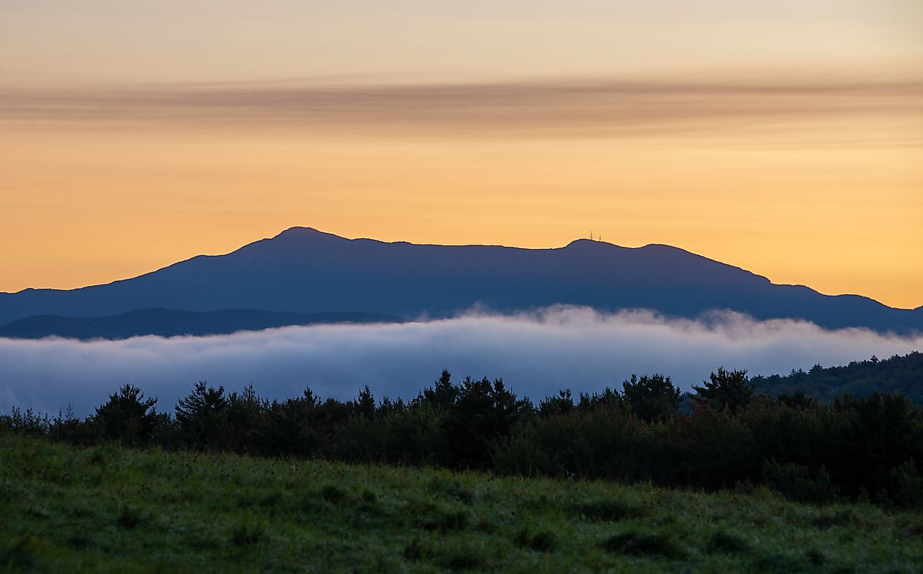 Mount Mansfield, Vermont at a summer sunrise. Via Cvernet Photography / Shutterstock.com