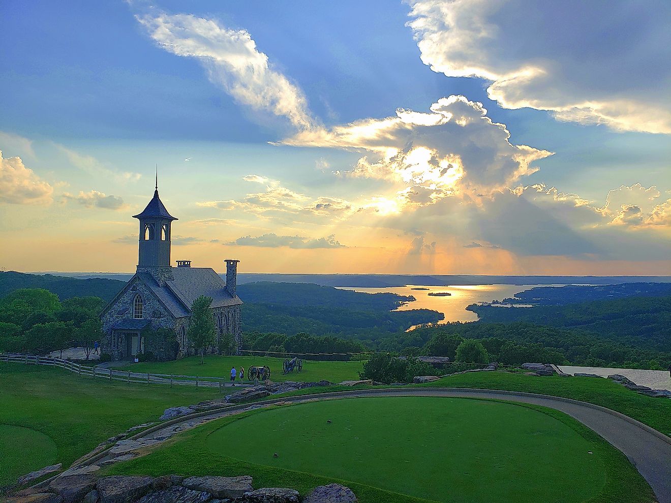 Chapel of the Ozarks in Branson, Missouri at Sunset with Table Rock Lake in the background.