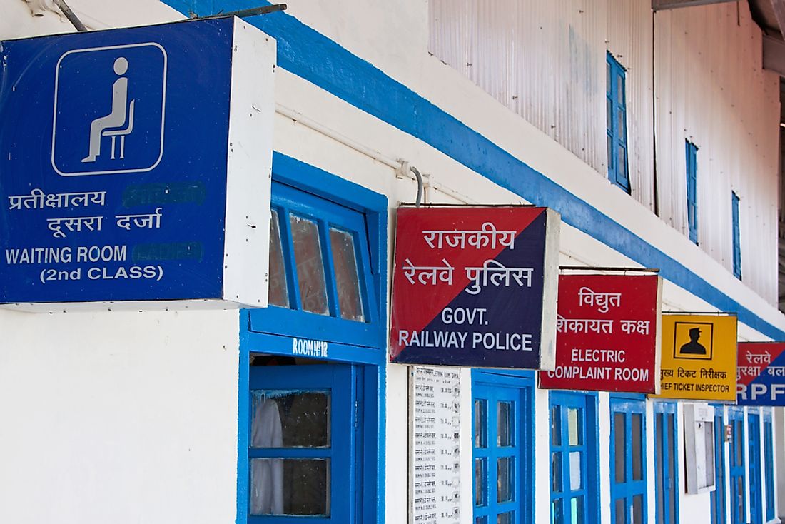 Signs in India, seen in both English and Hindi. 