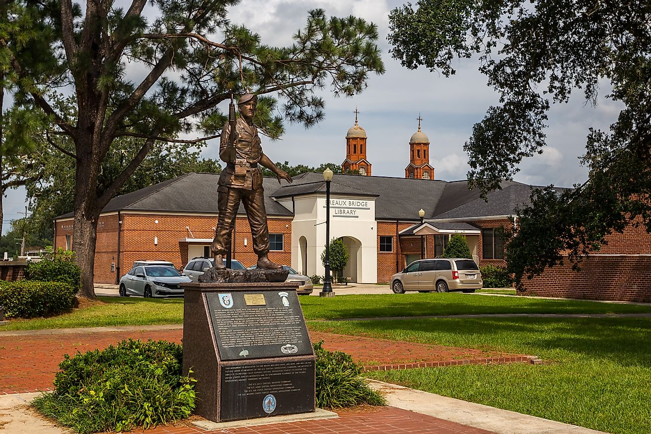 Statue near public library building, installed in honor of the Green Berets, in Breaux Bridge, Louisiana. Editorial credit: Victoria Ditkovsky / Shutterstock.com