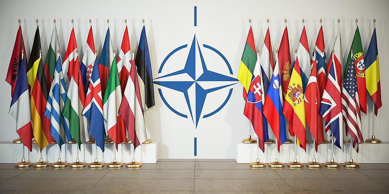 The NATO insignia with its member countries' flags. Image credit: Maxx-Studio/Shutterstock