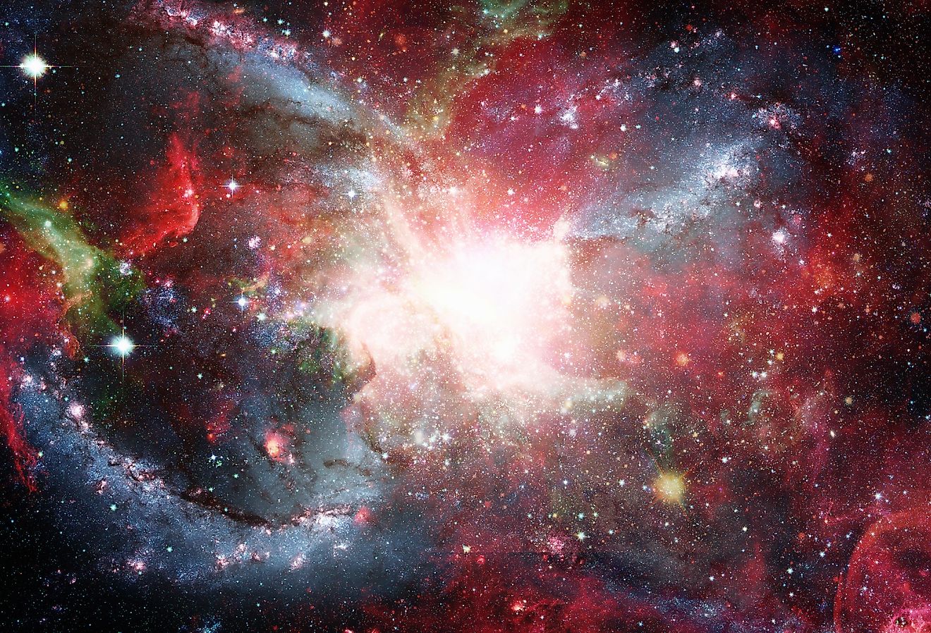 Open space filled with stars, nebulae and galaxies.