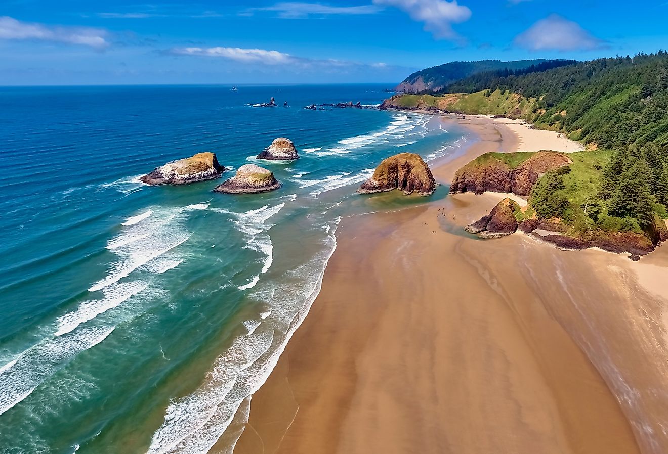 Aerial panorama shot at approximately 350 feet above Cannon Beach looking towards Ecola State Park.