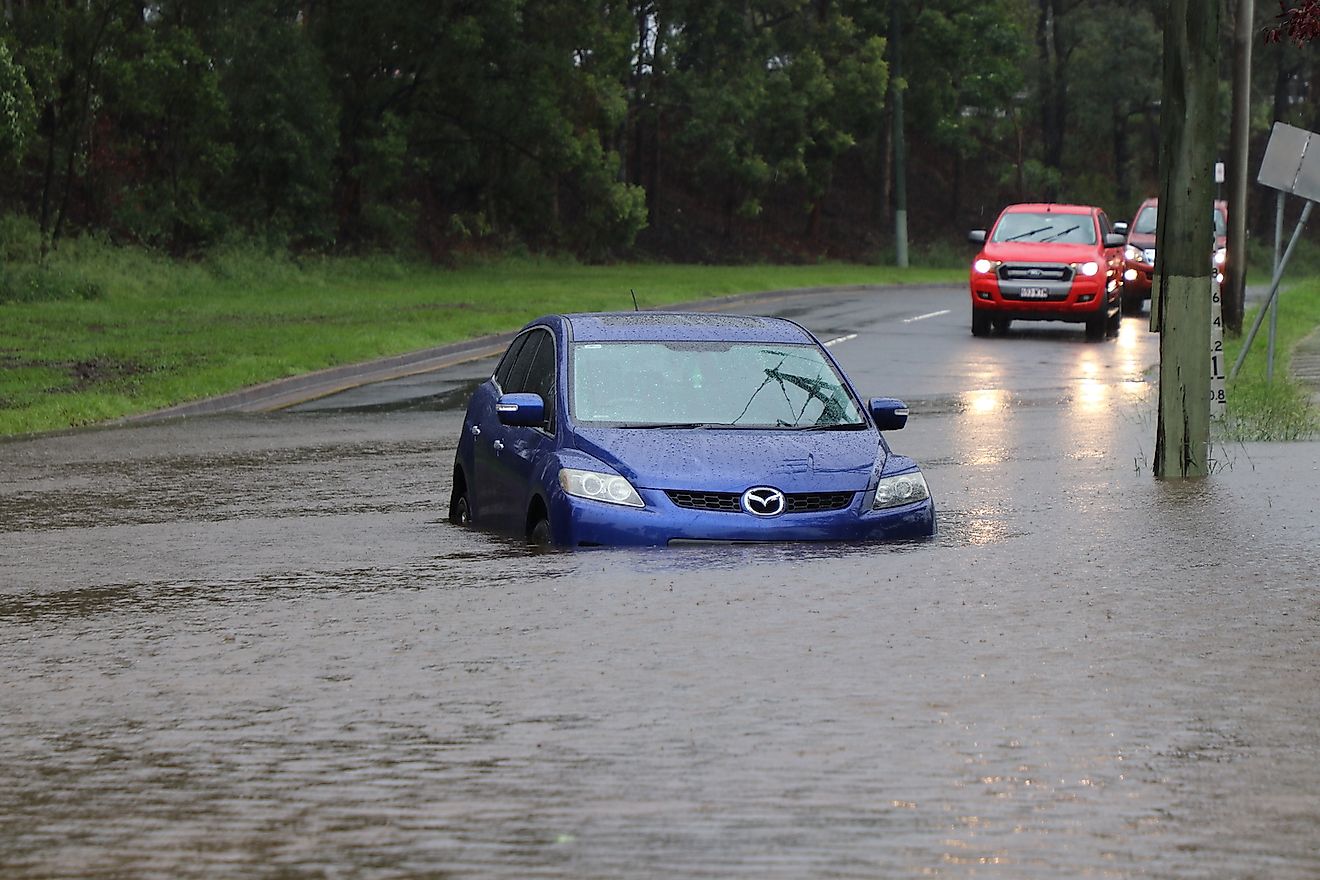 Car stuck in the suburb of Rocklea, Brisbane, Australia in floodwater from huge rainfall as a result of Tropical Cyclone Debbie. Image credit: Igor Corovic/Shutterstock.com