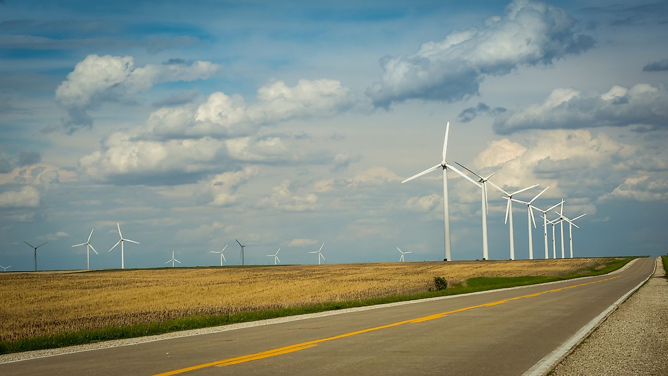 Wind turbines on a farm in Iowa on a cloudy day.
