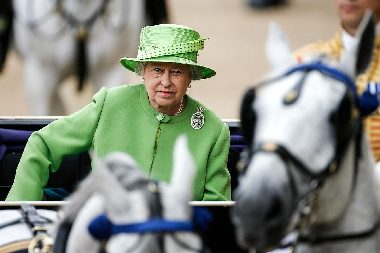 : Her Royal Highness Queen Elizabeth II travels by carriage during the Trooping the Colour ceremony. Editorial credit: Alessia Pierdomenico / Shutterstock.com