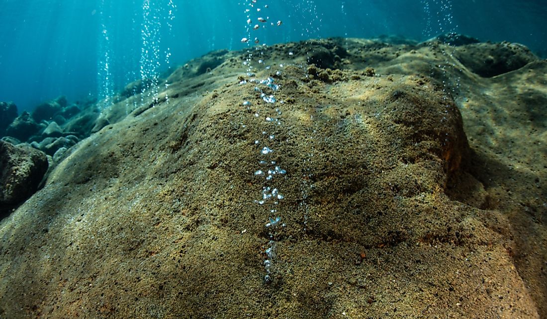 Bubbles rise from the seafloor near the active volcanoes of the Pacific Ring of Fire.