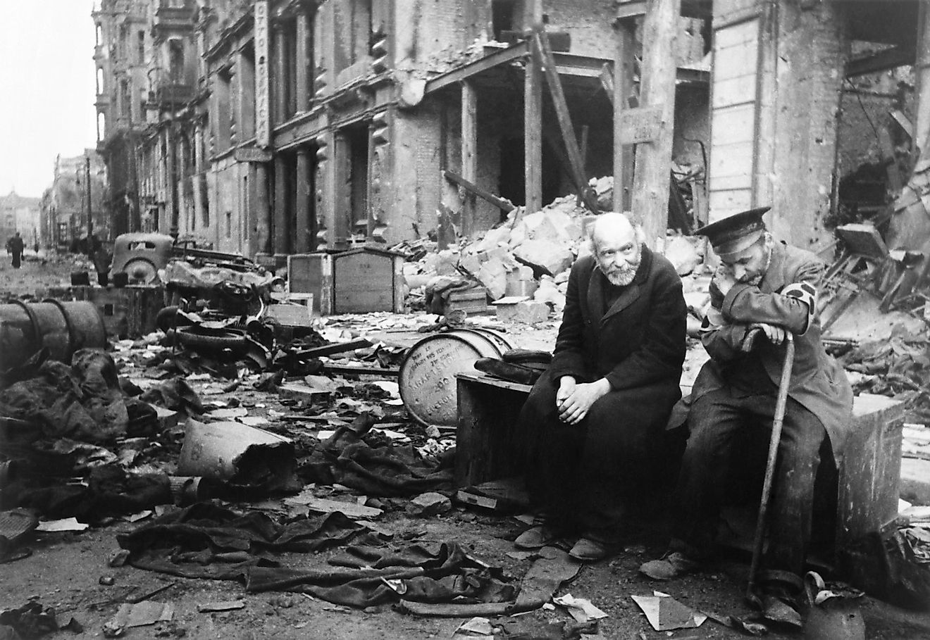 Two aged men lamenting on the destruction of Berlin.