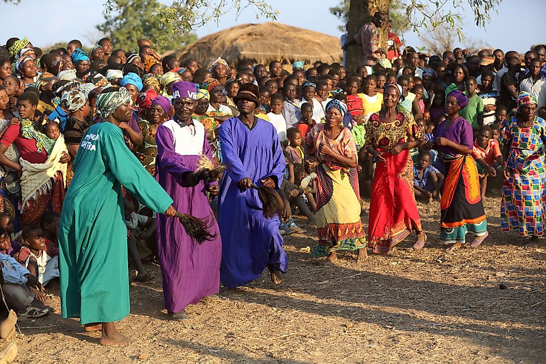 Traditional dancers at a Gule Wamkulu ceremony near Mitundu, Malawi. Editorial credit: Dietmar Temps / Shutterstock.com.