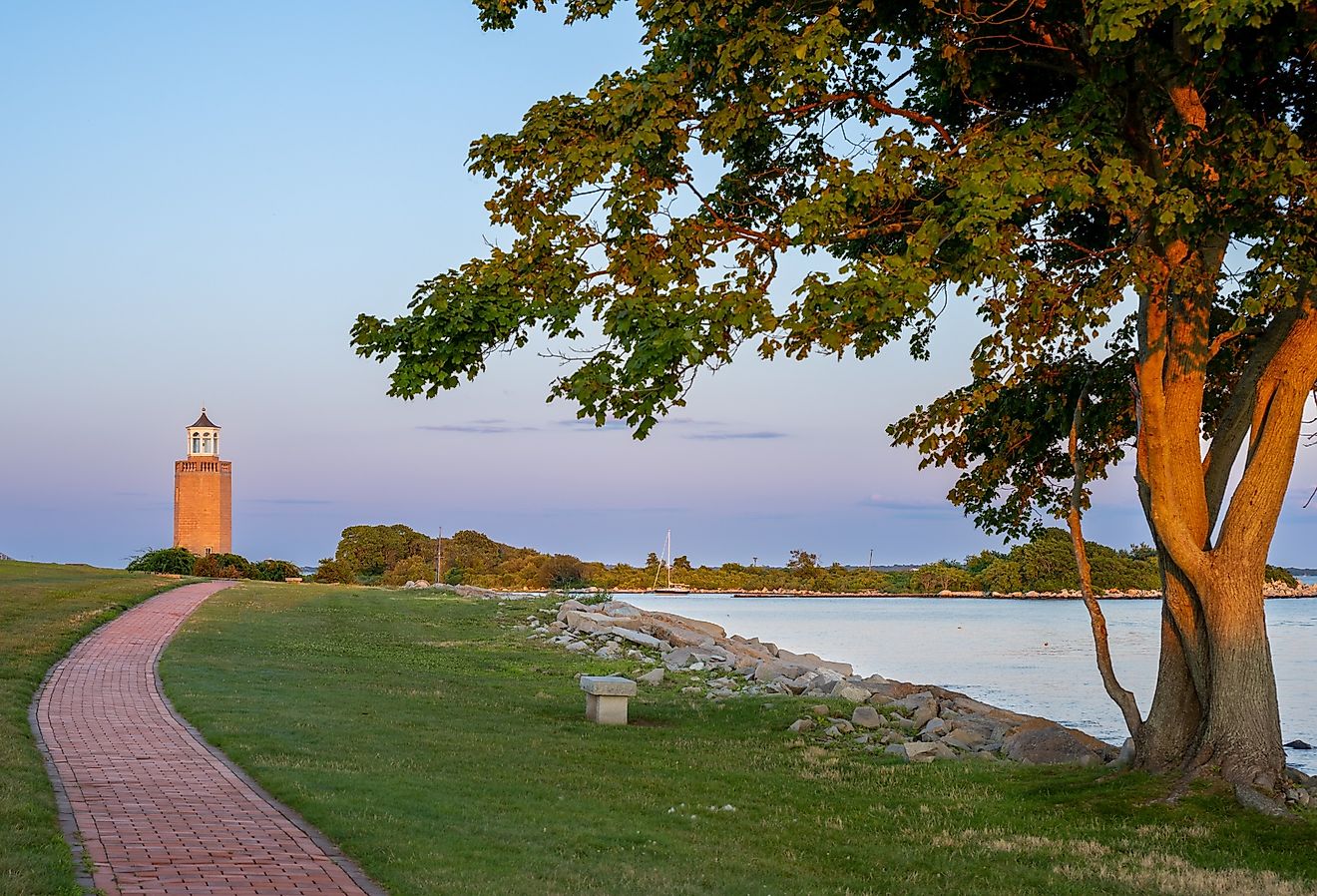 Avery Point Lighthouse in Groton, Connecticut, at sunset.