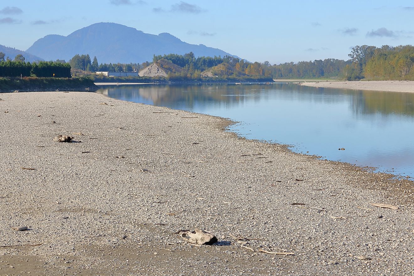 A severe drought has exposed the riverbed and significantly narrowed a major river, the Fraser, in southern British Columbia, Canada. Image credit: Eric Buermeyer/Shutterstock.com