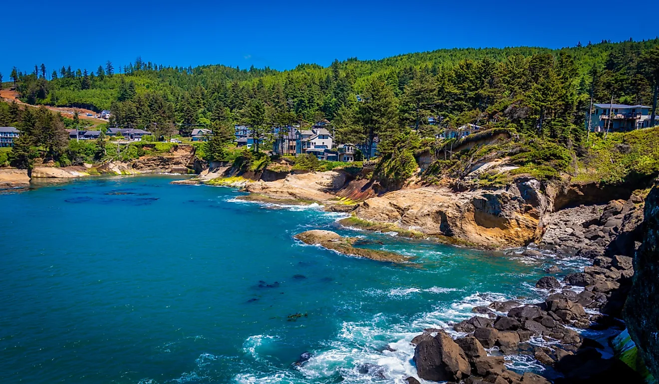 Aerial shot of Depoe Bay in Orgeon and its crystal blue waters