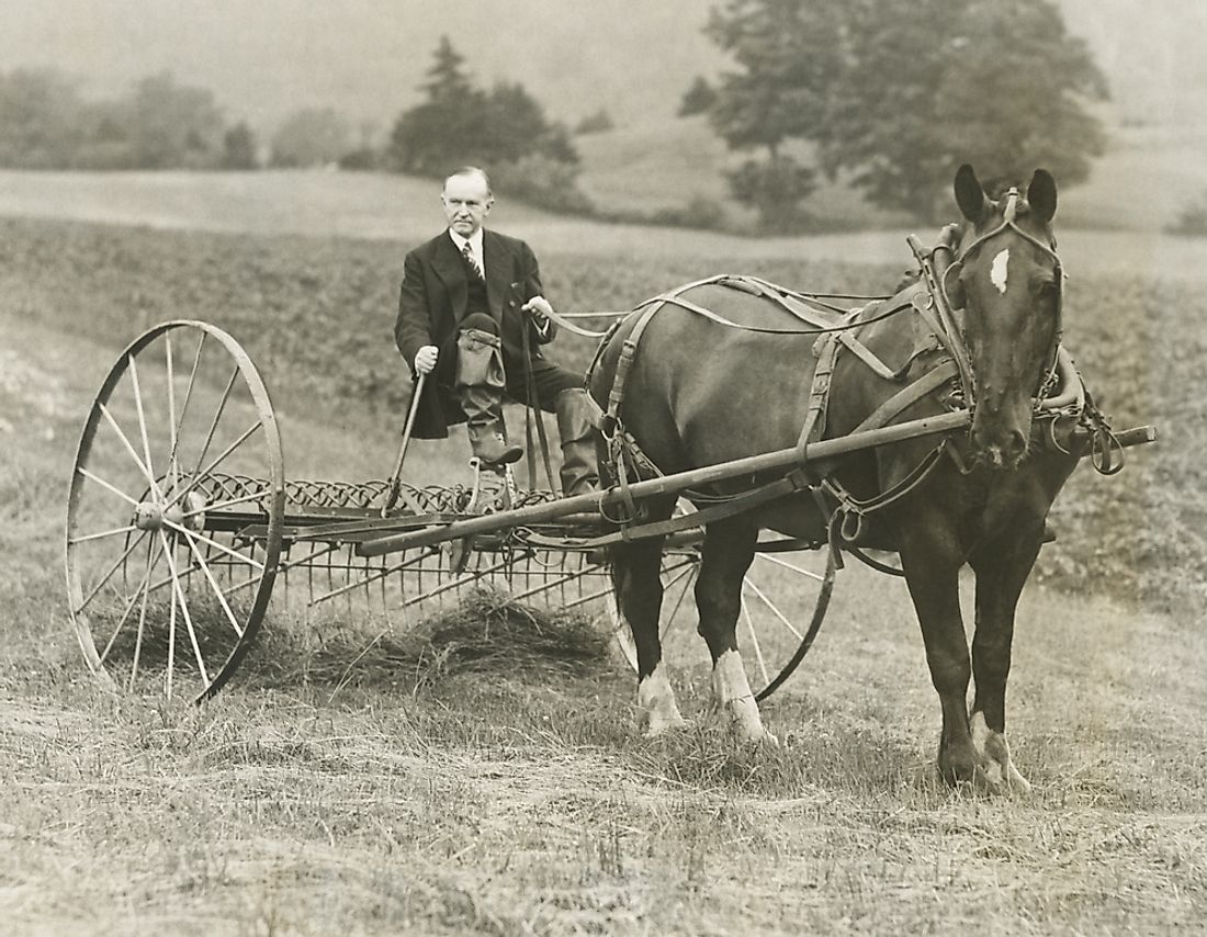 Coolidge retired to a quiet life as a boating enthusiast, hobby farmer, and sportsman after his Presidency. Above, he is raking hay at his childhood home in Vermont.
