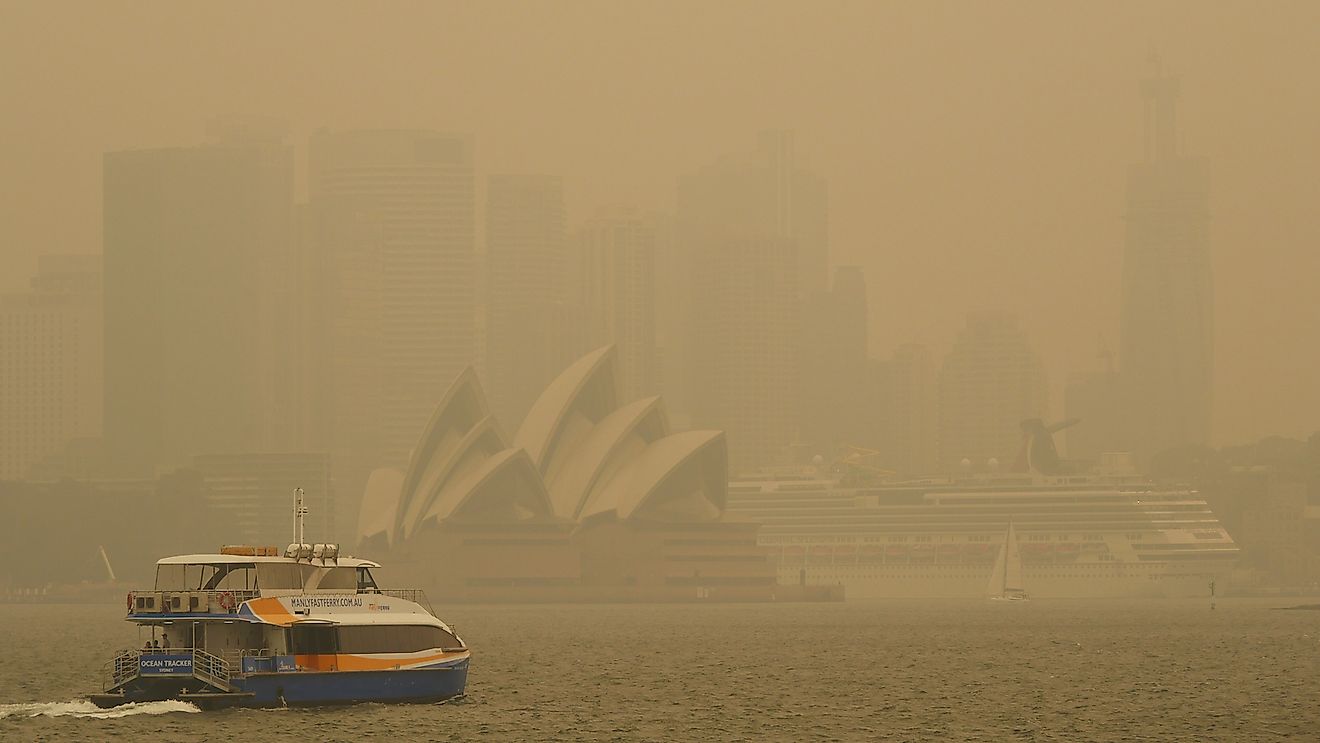 Ferry heading to Sydney Circular Quay in thick bushfire smoke. Editorial credit: M. W. Hunt / Shutterstock.com.