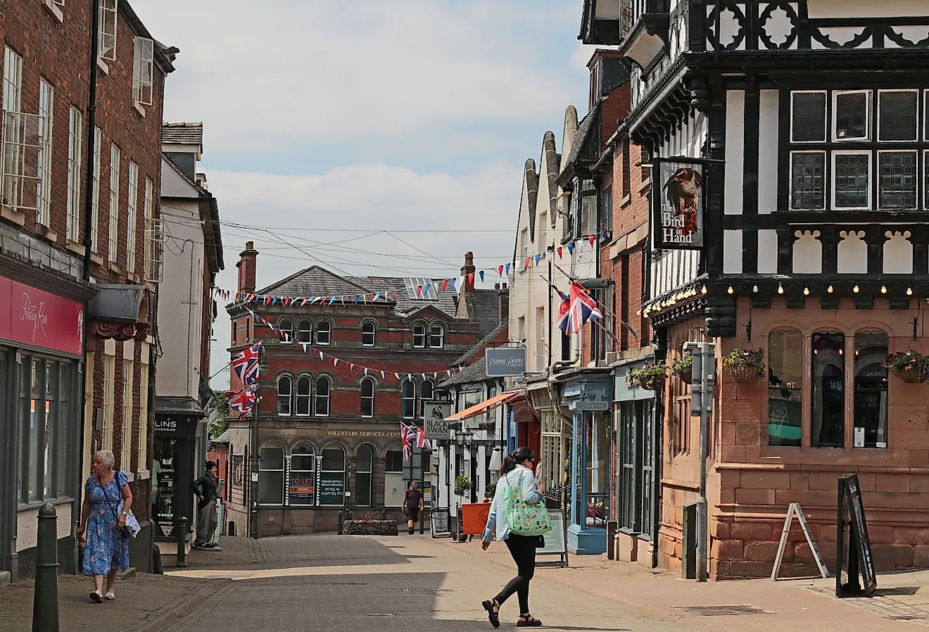 Sheep Market, a street in Leek, with the Bird in Hand pub and various shops. Image credit: Carol Tyers via Shutterstock.