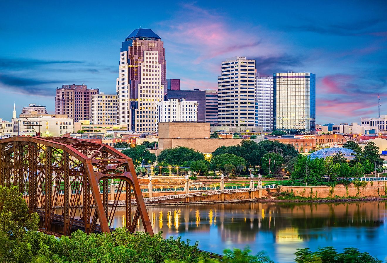 Shreveport, Louisiana, skyline over the Red River at dusk.