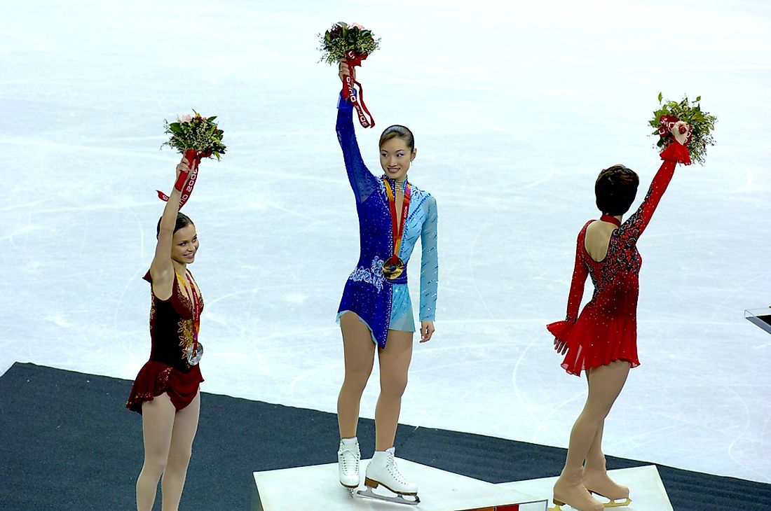 Editorial credit: Paolo Bona / Shutterstock.com. Figure skating winners stand on the podium. 