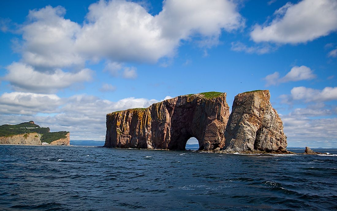 At low tide, Perce Rock is linked to the mainland by a sandbar.