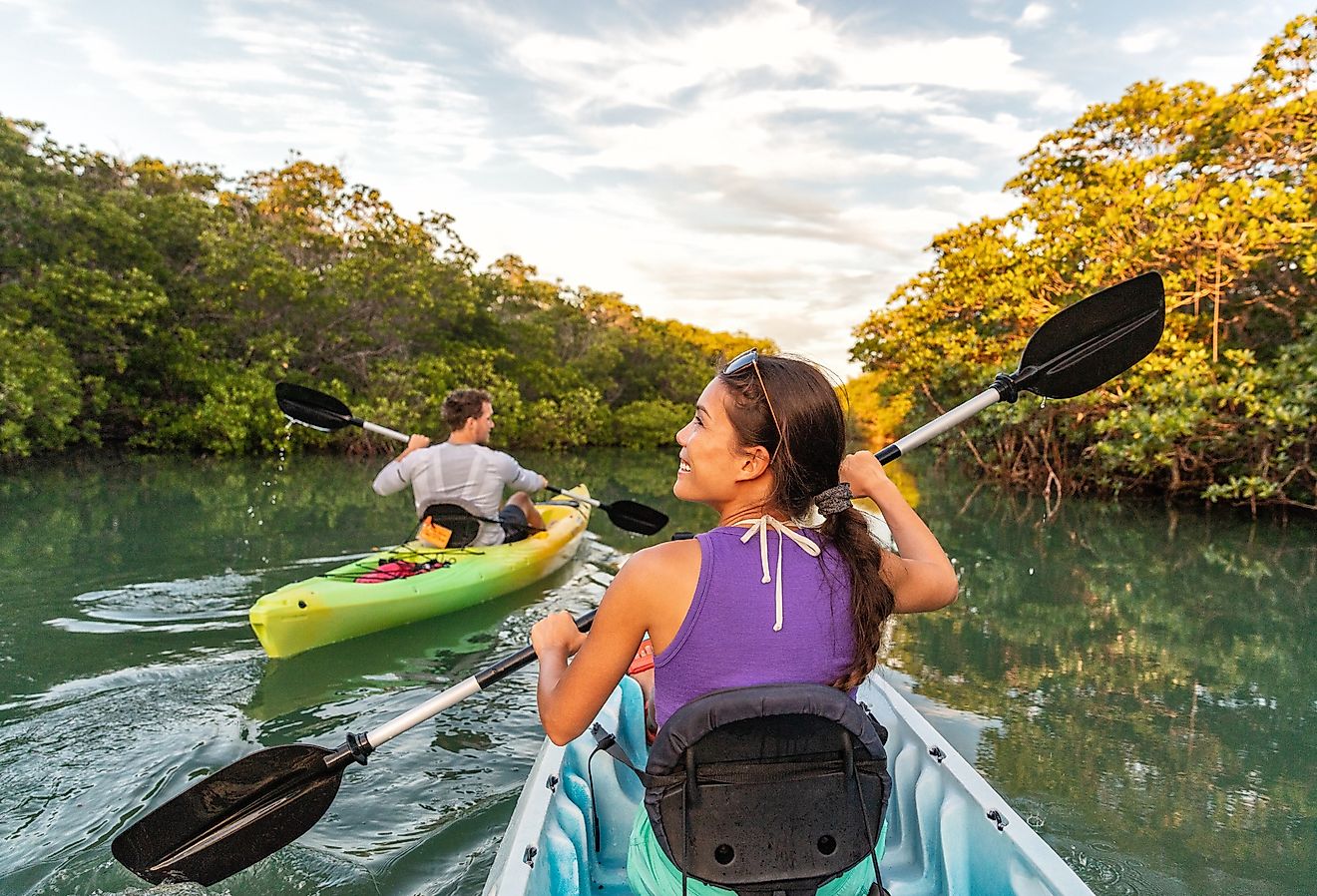 Couple kayaking together in the Everglades, Florida.