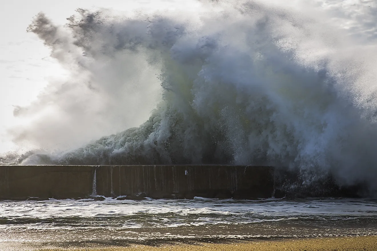 Huge wave by the ocean. 