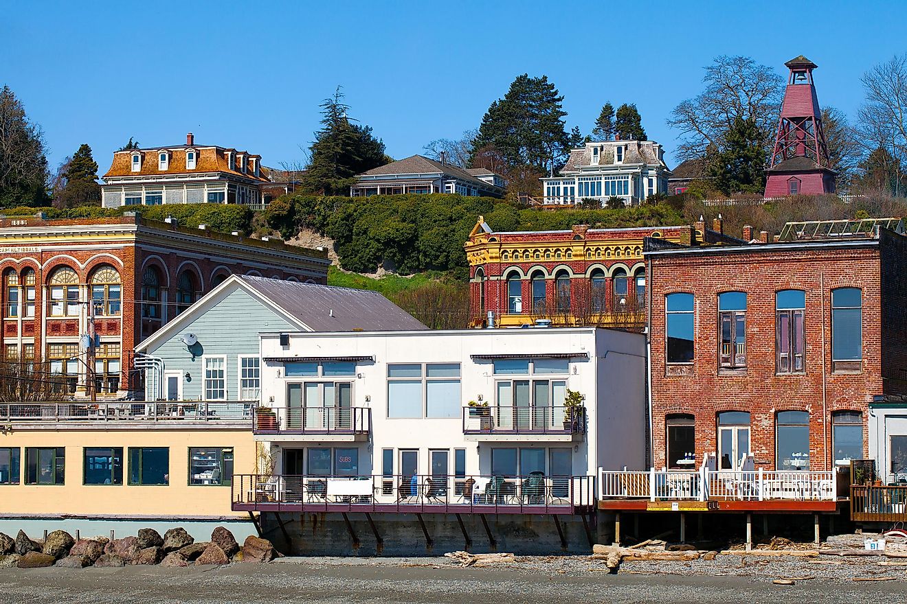 Port Townsend, Washington waterfront view of old Victorian era architecture on a clear sunny day with blue sky.