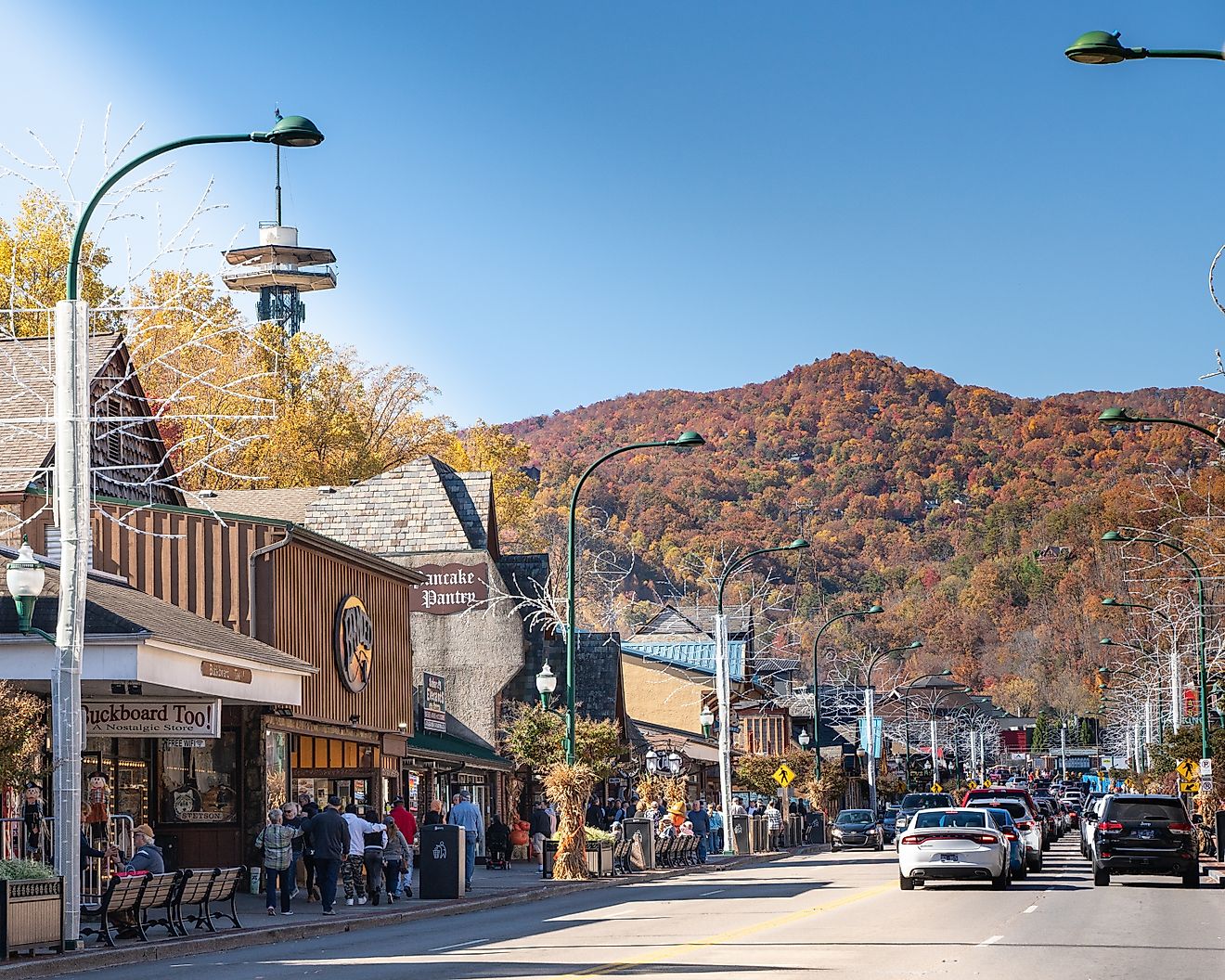 Street view of popular tourist city Gatlinburg, Tennessee, in the Smoky Mountains, with attractions in view. Editorial credit: Little Vignettes Photo / Shutterstock.com