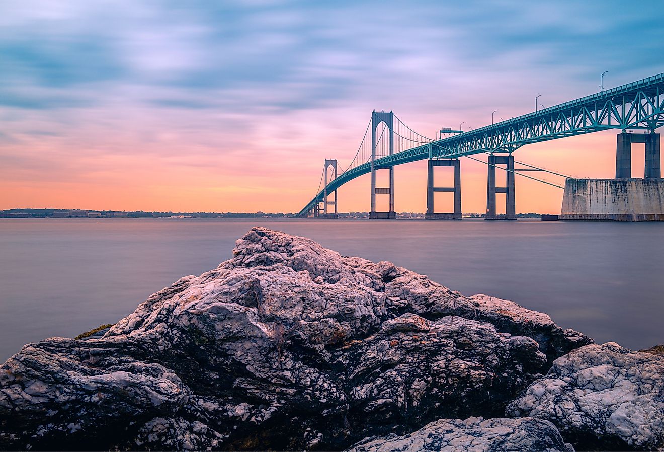 Dramatic beautiful sunset landscape over Claiborne Pell Newport Bridge, a modern tolled suspension bridge across Narragansett Bay, connecting Newport and Jamestown, Rhode Island