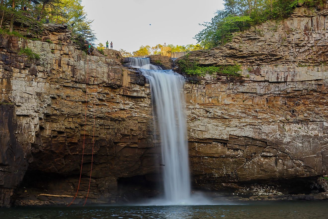 Hikers rappelling down DeSoto Falls in Northeast Alabama.