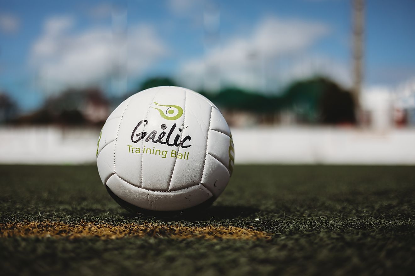A Gaelic football on pitch. Image credit: jjmtphotography/Shutterstock.com
