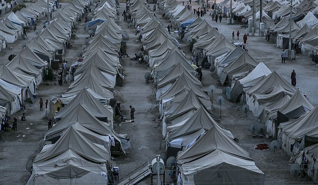 Thousands of Syrian refugees live at the Akcakale Tent Camp in Urfa, Turkey.  Editorial credit: Tolga Sezgin / Shutterstock.com